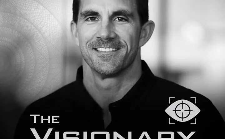 Sharp black-and-white portrait and branding reading 'The Visionary Chronicles' with an eye icon